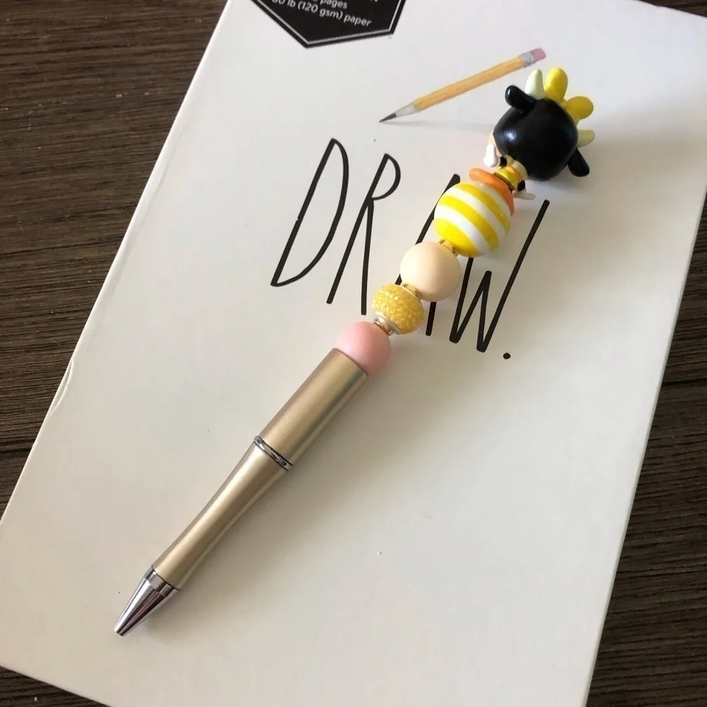 Disney Doorables: Mickey & Friends: Clarabelle Cow handmade beaded pen